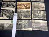 several old black and white photos of people and animals on a table