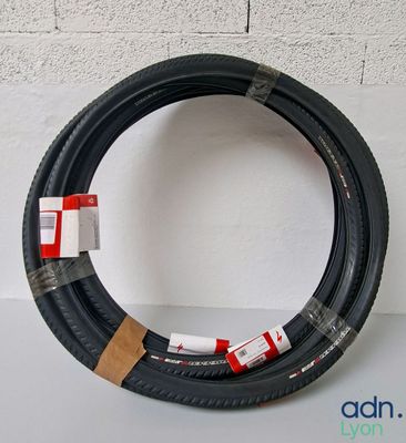 a black tire with a red and white stripe on it