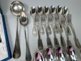 a lot of spoons and spoon spoons on the table