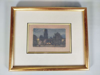 photo encadrée représentant une ville avec une tour horloge en arrière-plan