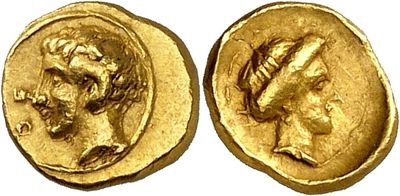 a gold coin with an image of a woman and a man on it