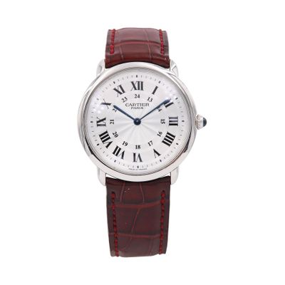 a close up of a wrist watch with roman numerals on it