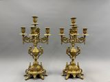 pair of antique brass candelabs