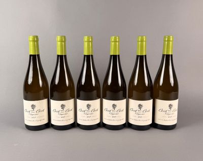 six bouteilles de vin alignées les unes à côté des autres
