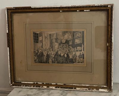une vieille photo montrant un groupe de personnes assises dans une pièce