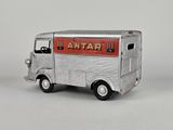 a toy truck that is sitting on a white surface