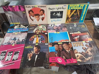 a lot of vinyl records on a table