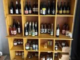 many bottles of wine on the shelves in the room
