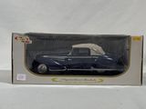 an image of a toy car in a box on a white surface