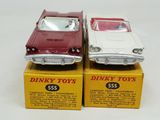 two toy cars that are sitting on top of each other
