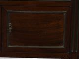 a small wooden cabinet with a clock on top of it