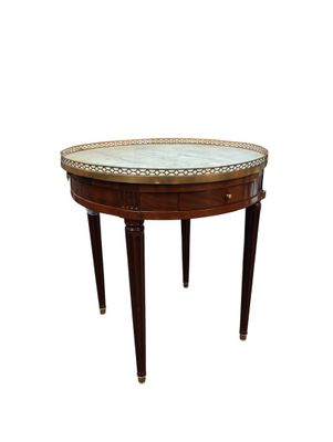une image d'une petite table avec un plateau en marbre