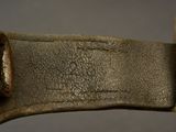 a close up of a piece of metal with rust on it