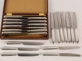 a box with a set of knives and knives in it