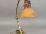 an image of a table lamp with a glass shade on it