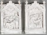 pair of white marble wall plaques depicting the nativity of jesus and the infant jesus