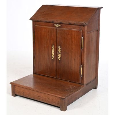 a small wooden cabinet with a door and a shelf