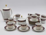 a lot of cups and saucers that are sitting on the table