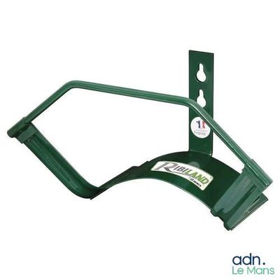 the green handle is attached to a metal wall mounted device