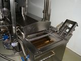 an image of a machine that is in the process of making something