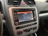 the dashboard of a car with a car radio in the center of it