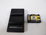 a close up of a battery and a battery charger on a table