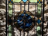 a stained glass window with a star on it