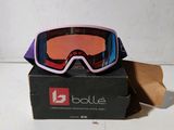 a box with a pair of ski goggles sitting on top of it