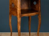 an old wooden table with a drawer on top of it