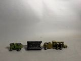 a toy train that is sitting next to other toy trains