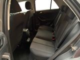 the back seats of a car are empty and the passenger seat is empty