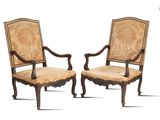 pair of louis ii style walnut armchairs with upholstered upholstered arms