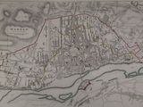 une vieille carte de la ville de Londres sur laquelle figure une ligne rouge