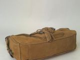 tan leather suitcase on white background with white background