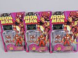 six action figures of iron man in pink boxes on a white surface