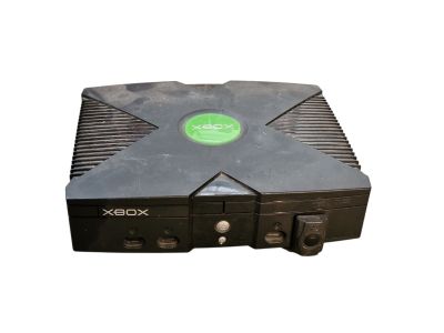 a close up of a black box with a green sticker on it