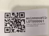 a sticker with a qr code on it sitting on a table