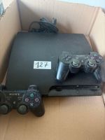 Un PS3 - en l'état, non testée.