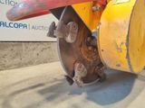 a close up of a machine that is sitting on the ground