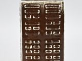 a brown and white vase with numbers on it