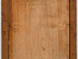 a painting of a wooden frame with writing on it