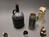 many different types of beer mugs on the table