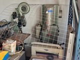 a small room with a lot of stuff on the floor