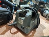 an image of a small air compressor on a table