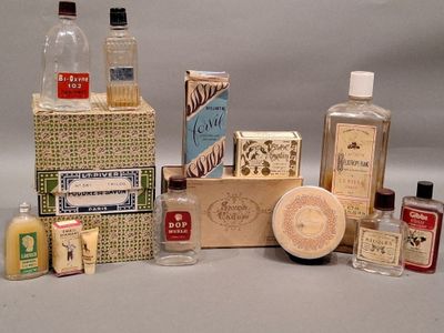 many different types of soaps and lotions on the table