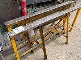 a table that has a fire extinguisor on top of it