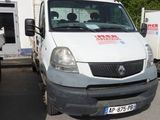 a white van that is parked in a parking lot