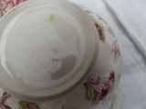 a close up of a plate and a cup on a table