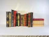 a lot of books that are sitting on a table
