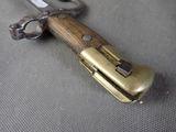 a close up of a knife on a table